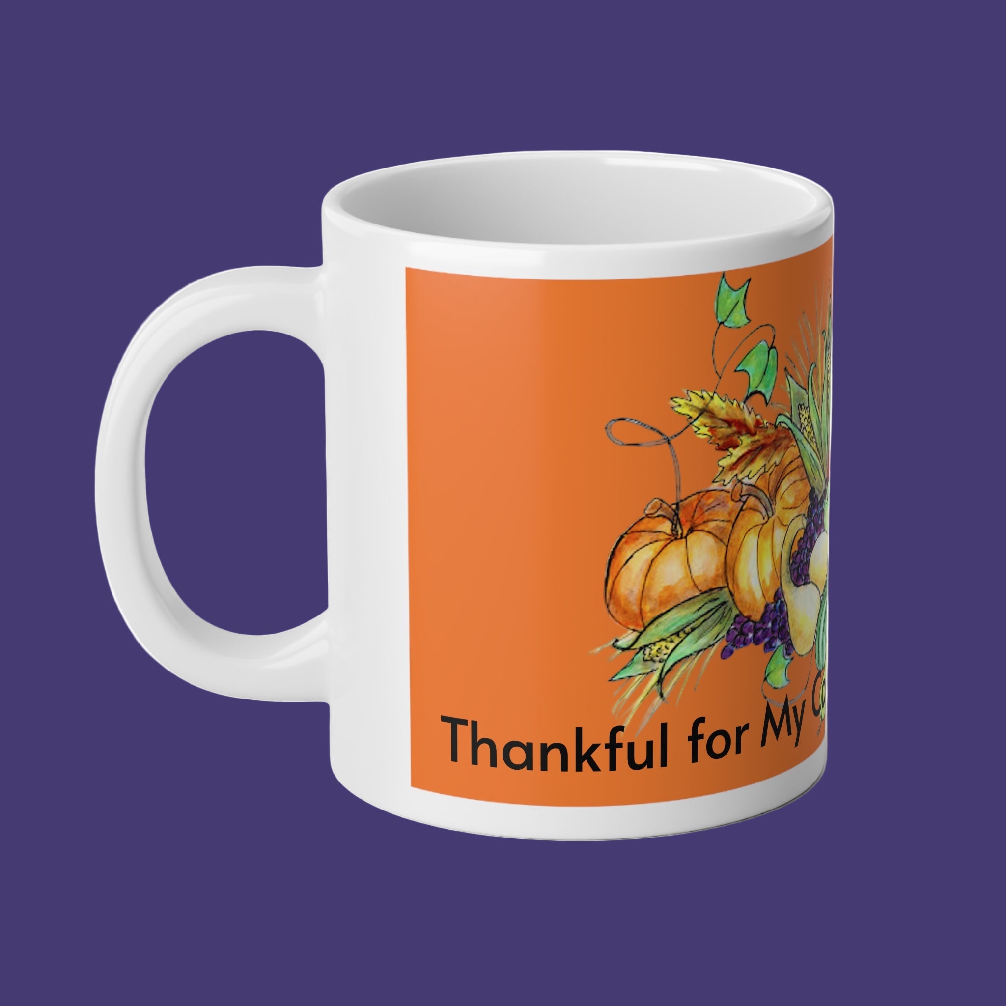 White mug with an orange design featuring pumpkins and the text 'Thankful for My Cornucopia of Blessings'