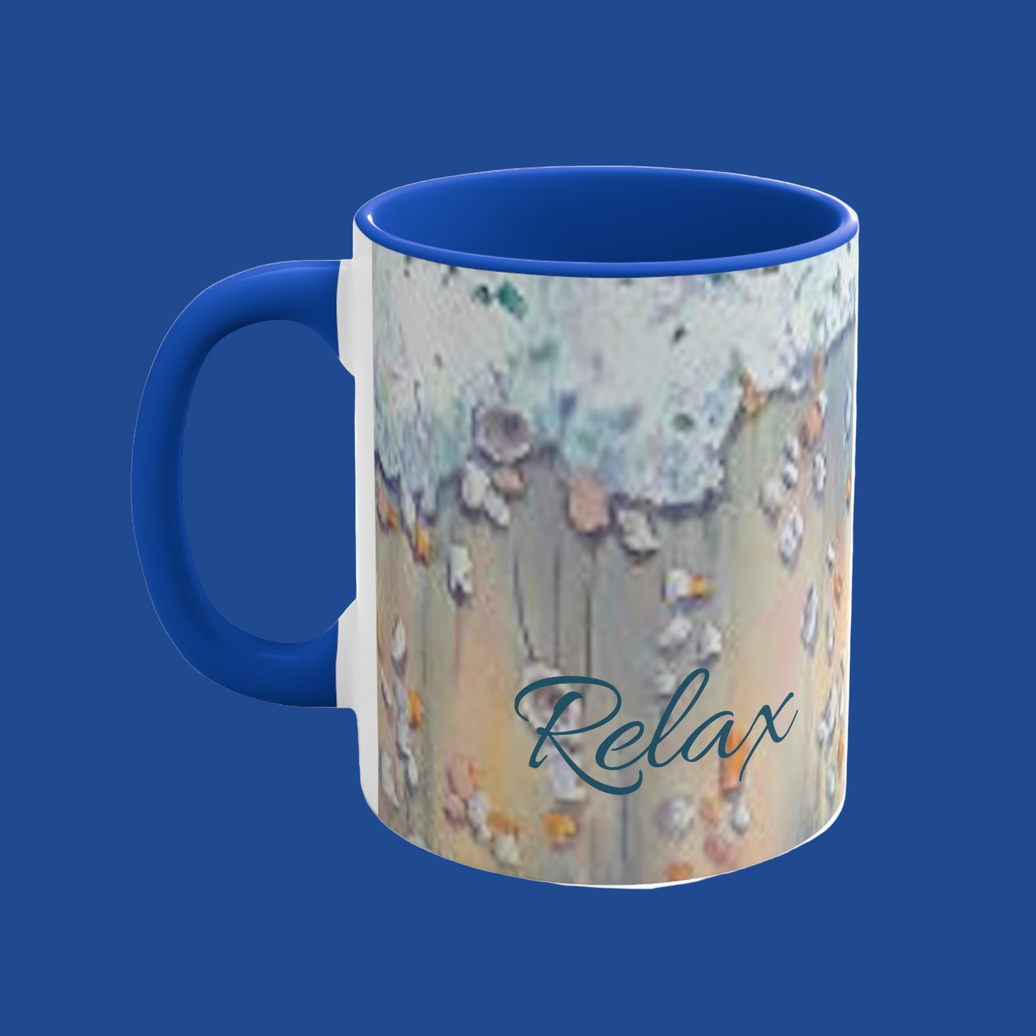 Mug with blue interior and handle, featuring a  beach surf design and the word 'Relax'.