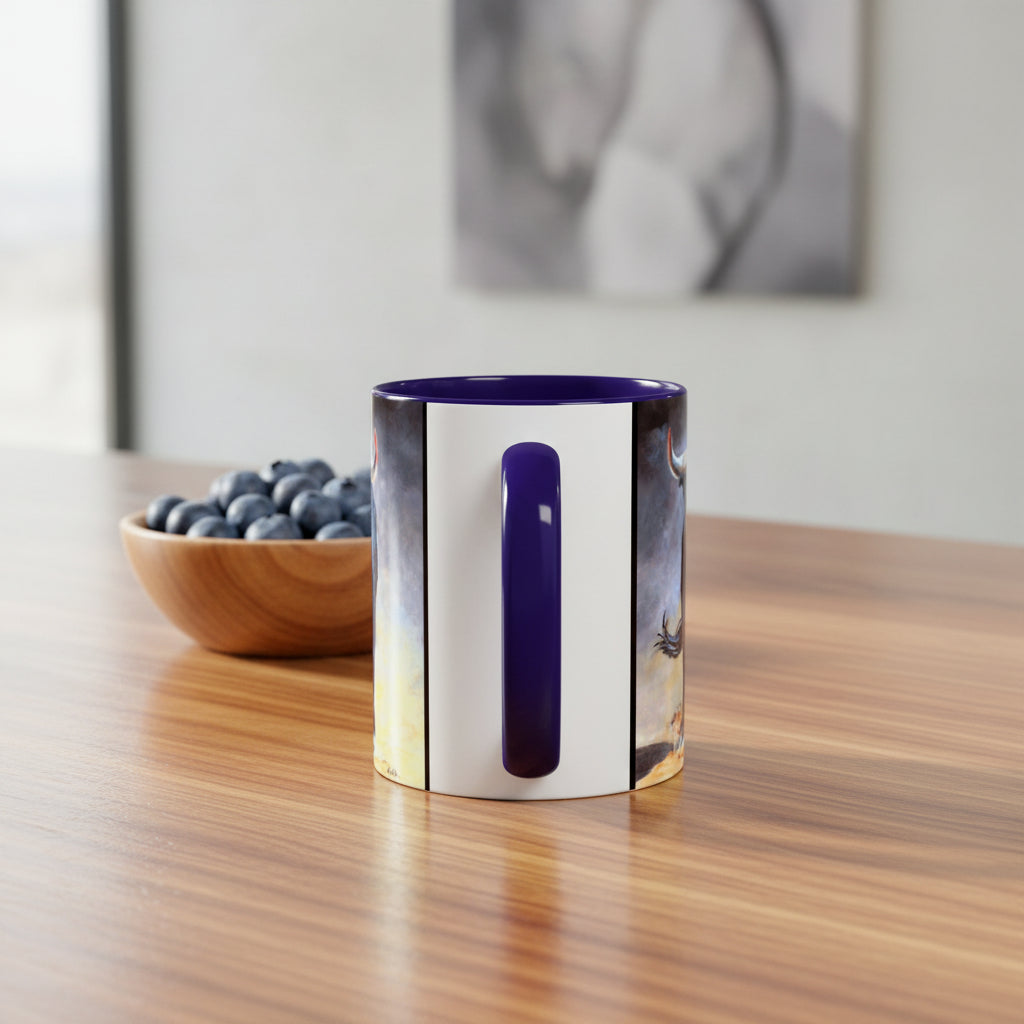 View of ceramic Mug Handle in blue with blue interior with painted bull on sides