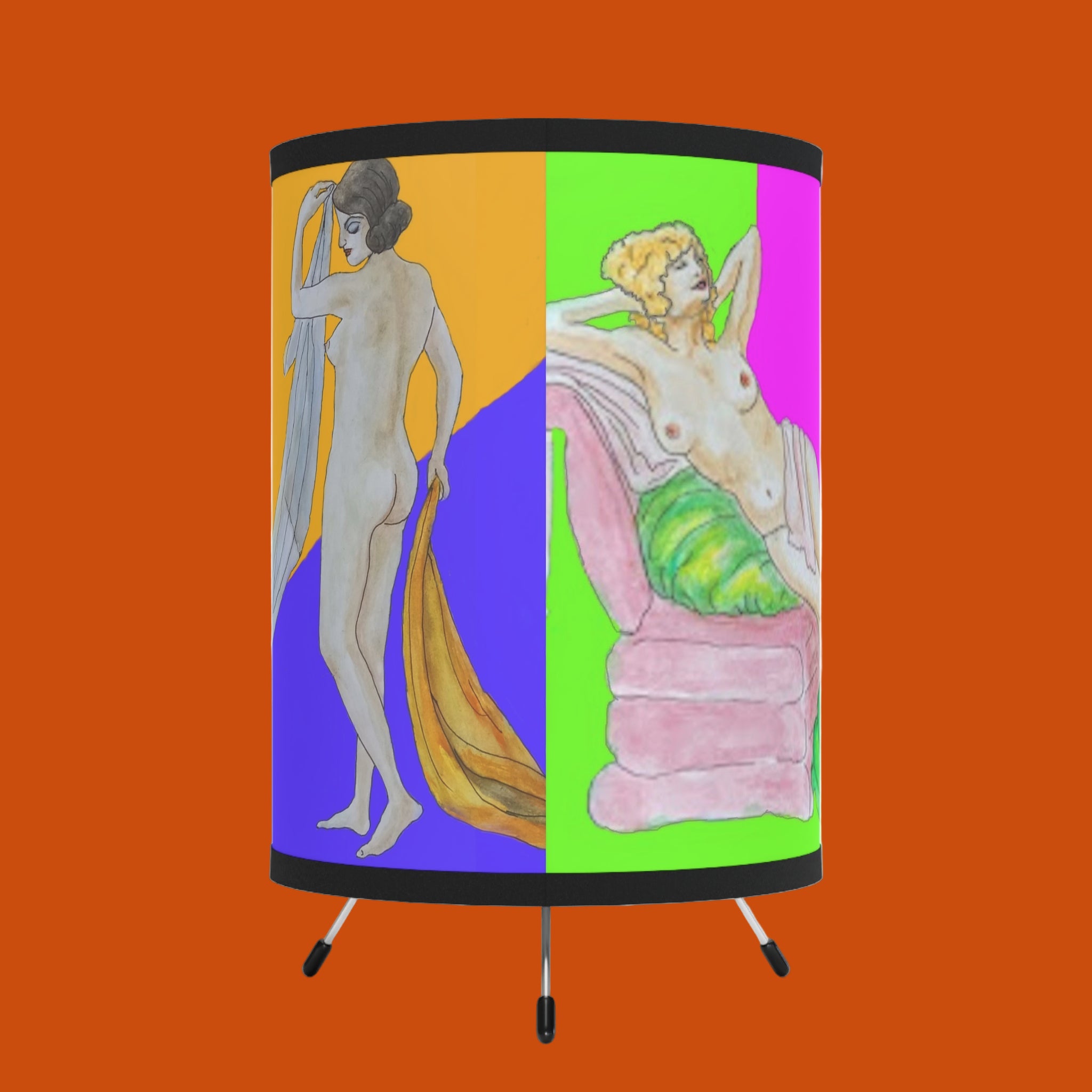 Decorative lamp with artistic designs of two women on a colorful background