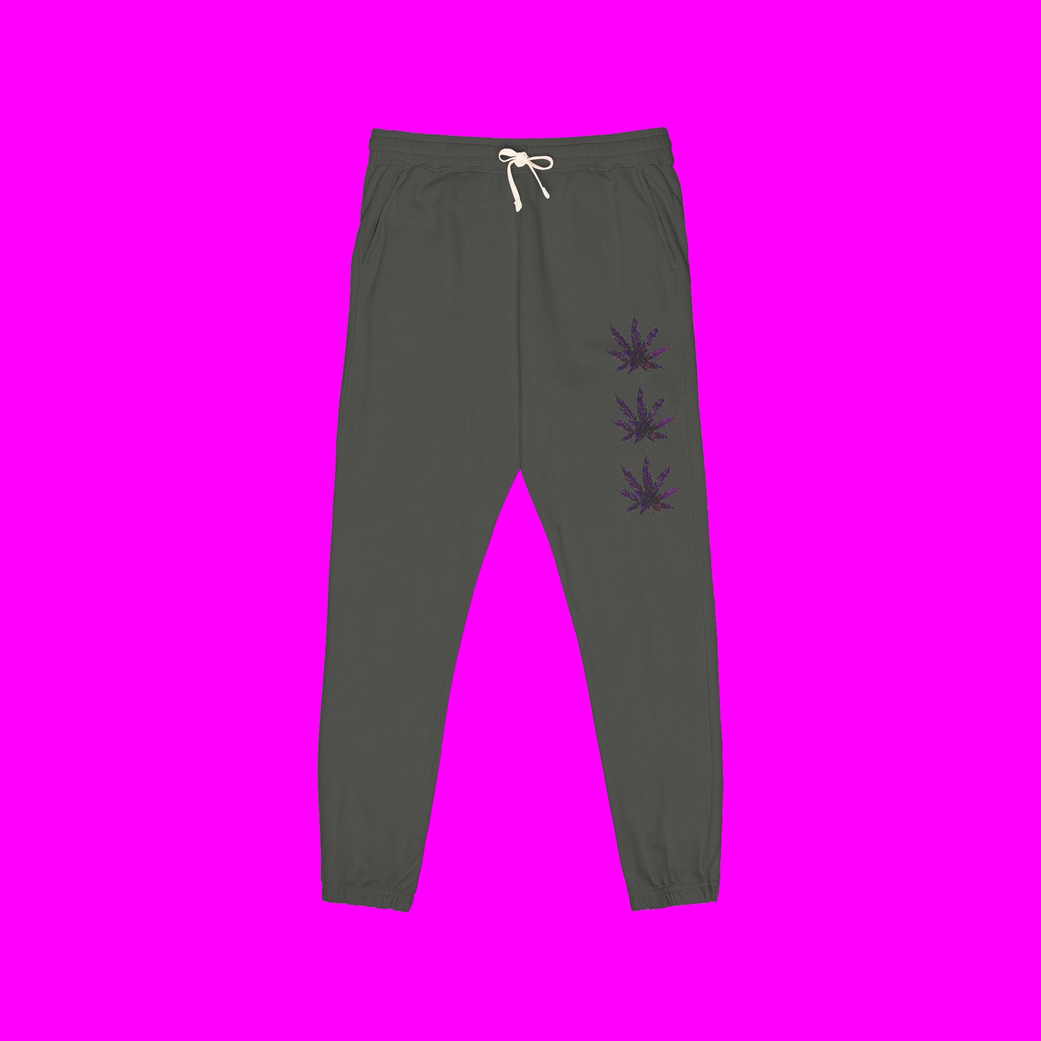 Dark gray sweatpants with purple leaf designs on a pink background