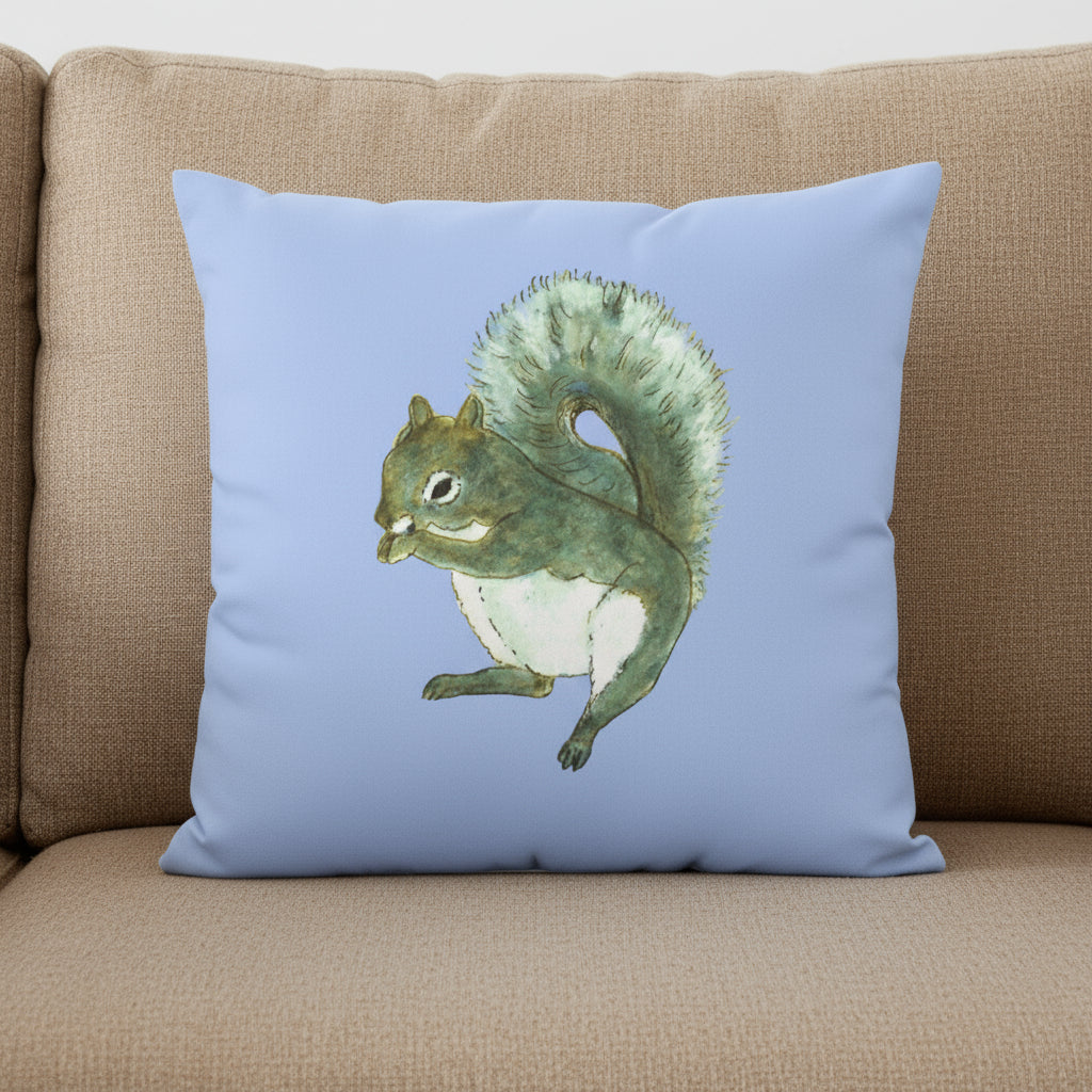 Pillow with a squirrel illustration on a light blue background