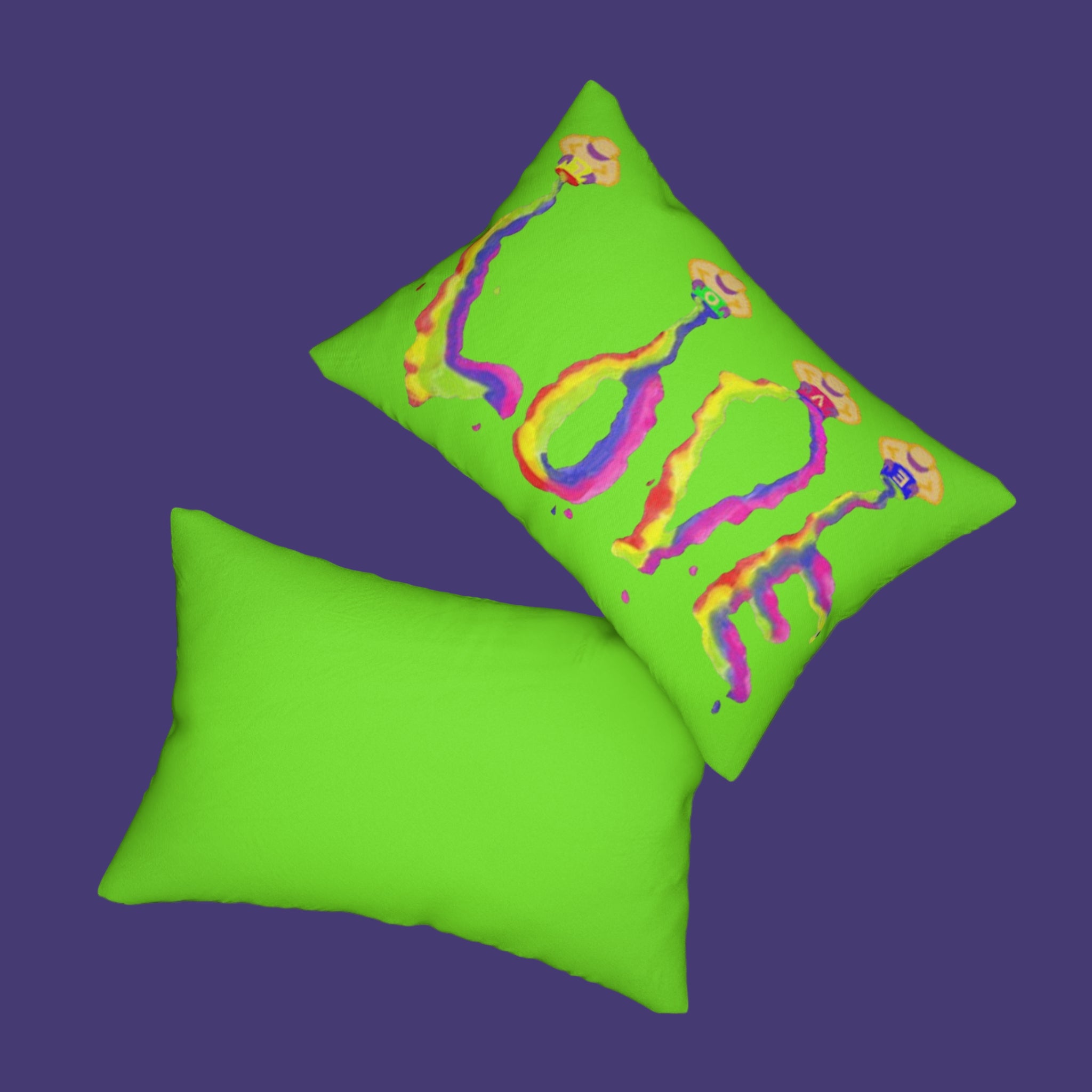 Two green pillows with colorful LOVE designs on a gray surface