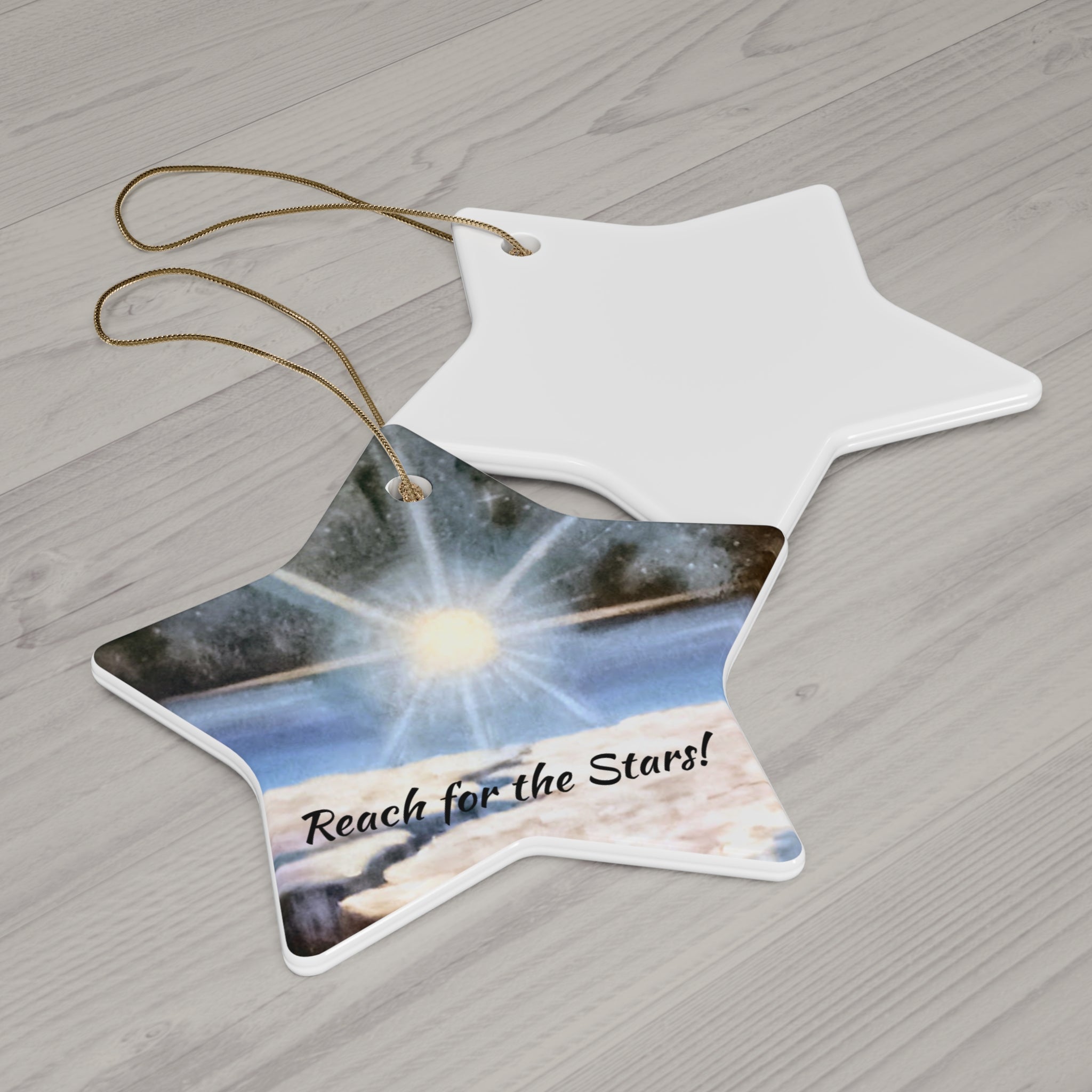 Star-shaped ornament with 'Reach for the Stars!' text on a wooden surface
