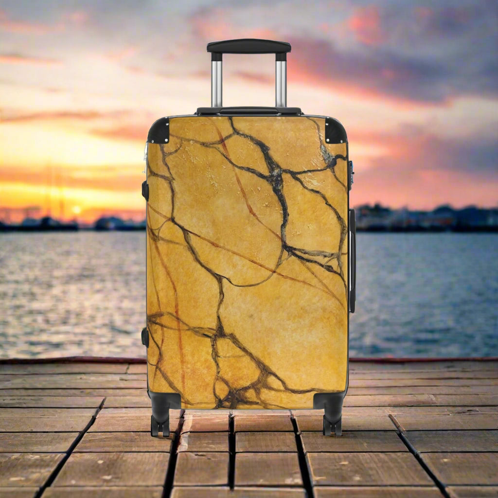 Marble-patterned suitcase on a white background