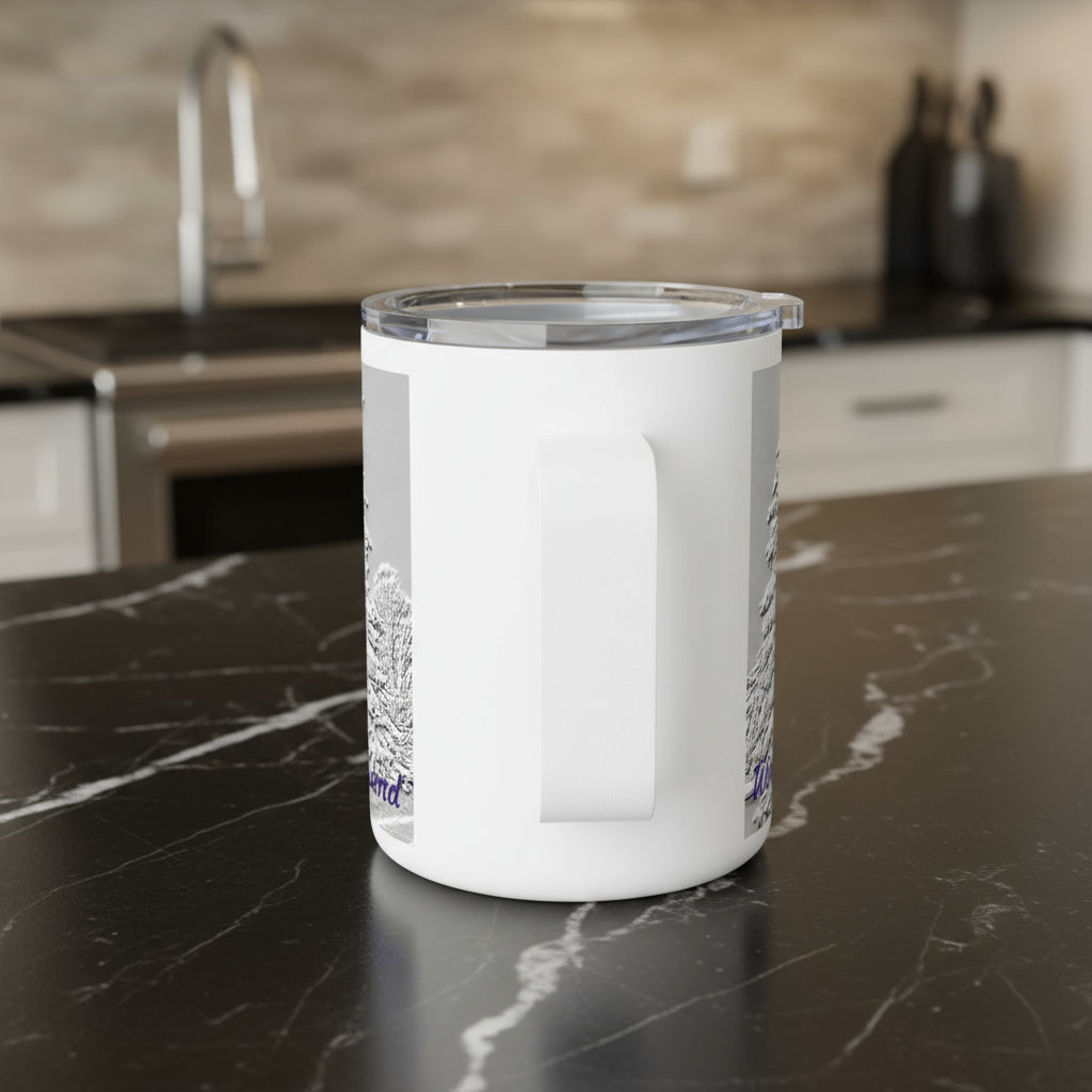 View of white mug's handle sitting on a kitchen counter