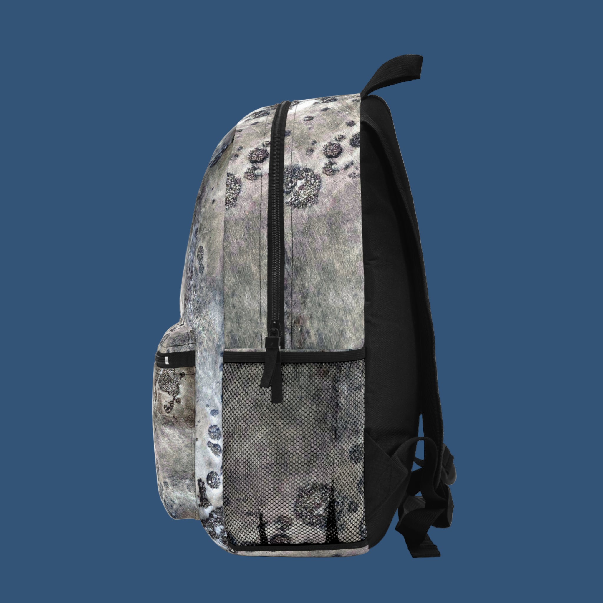 Backpack with a gray and black pattern on a blue background