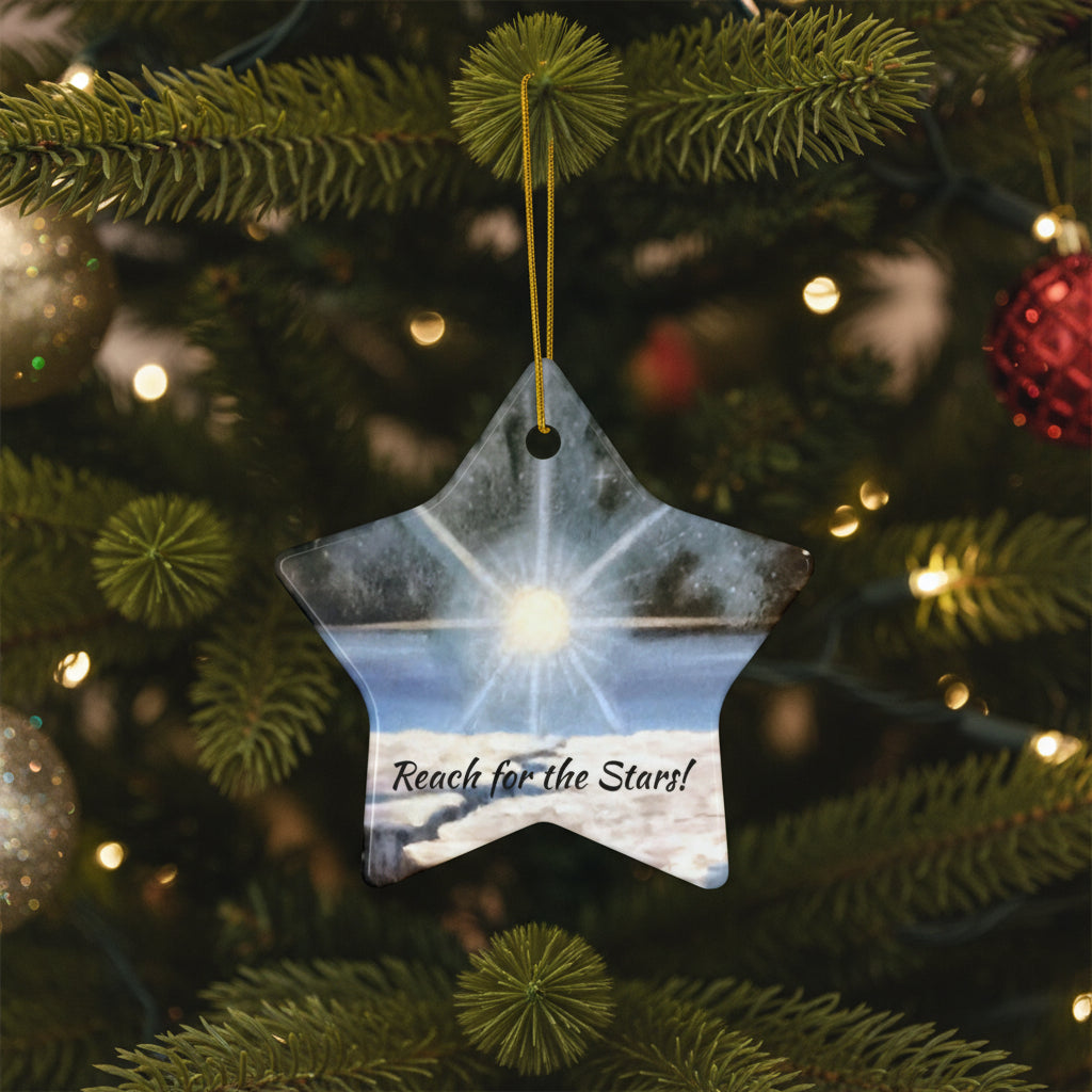 Star-shaped ornament with a bright shining star in the universe design and 'Reach for the Stars!' text.
