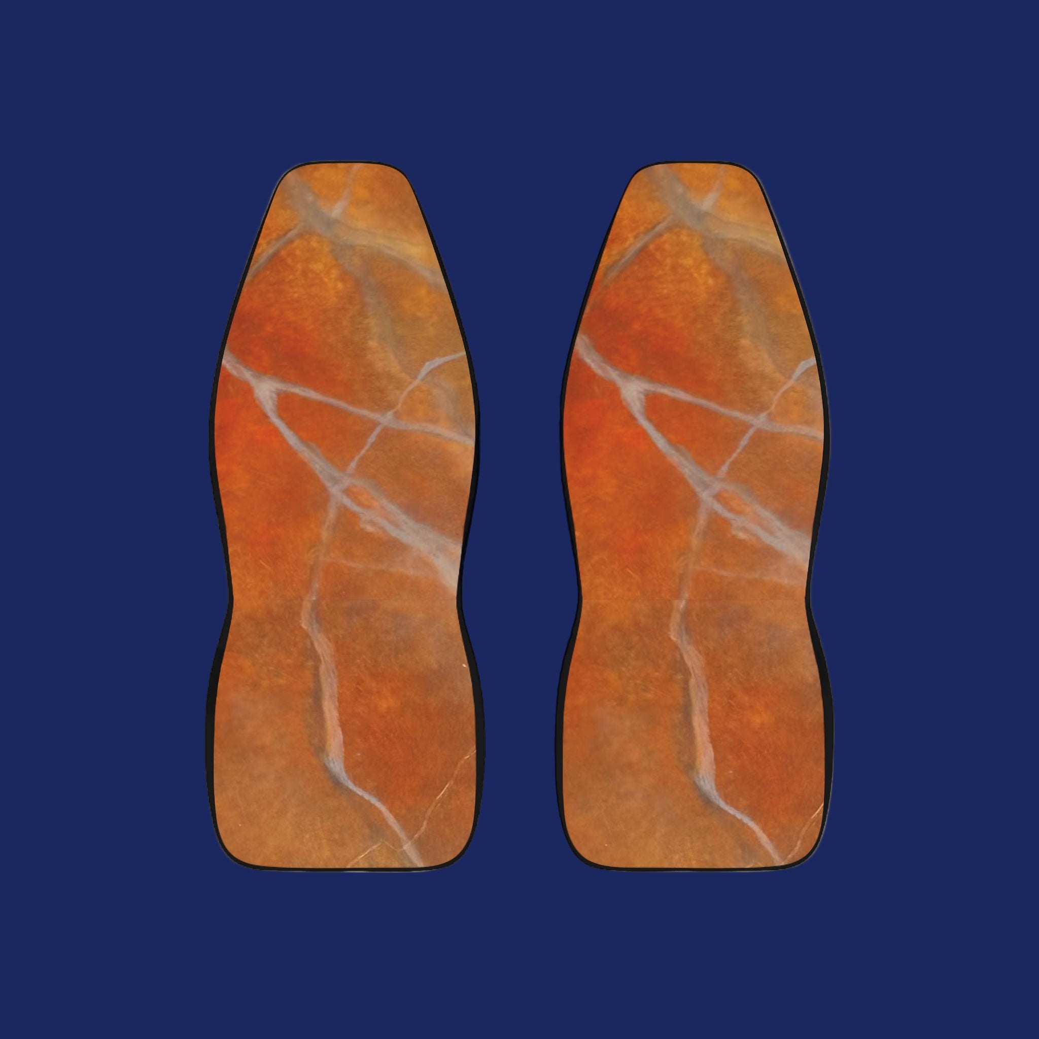 Pair of red/orange marble-patterned car seat covers on a white background