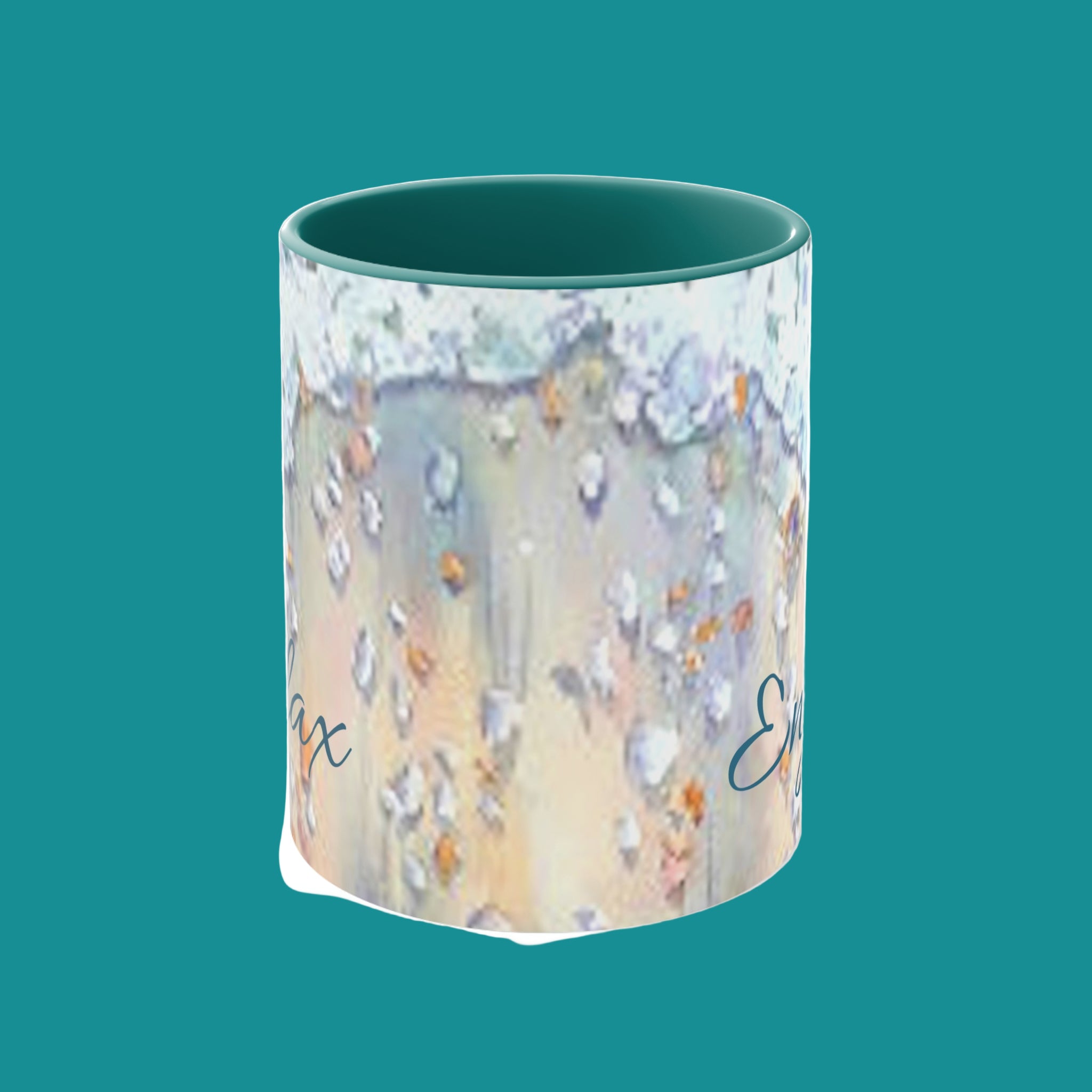 Mug with decorative design and text on a teal background