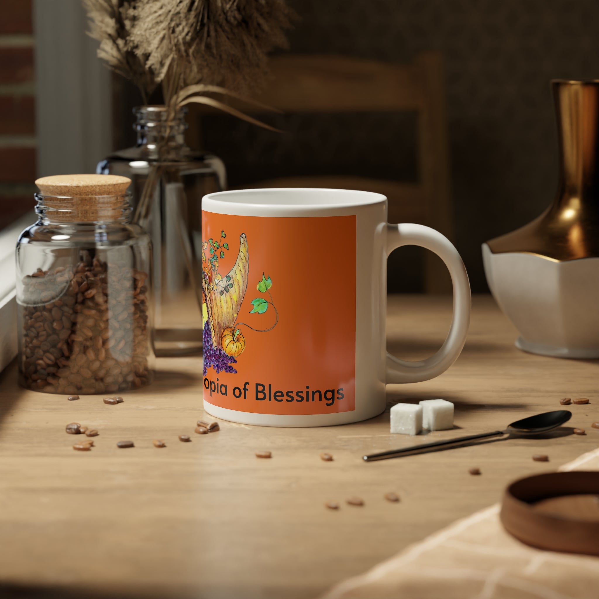 Mug with 'Cornucopia of Blessings' design on a wooden table with coffee beans and sugar cubes.