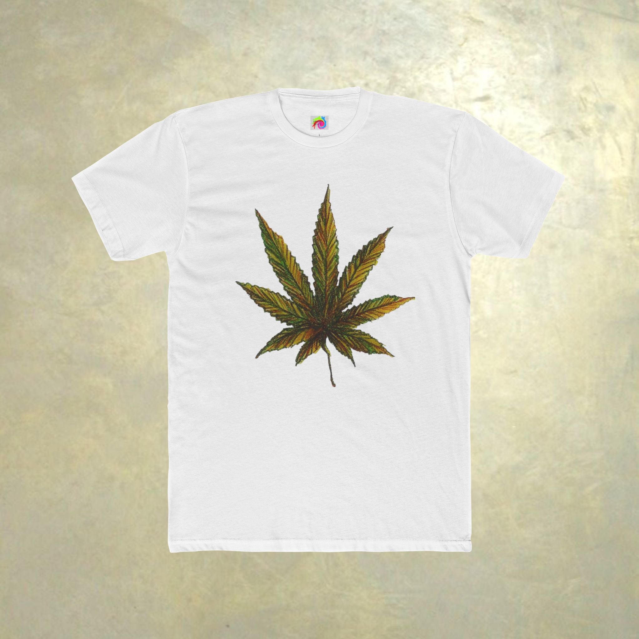 White t-shirt with a cannabis leaf design on a metallic gold background