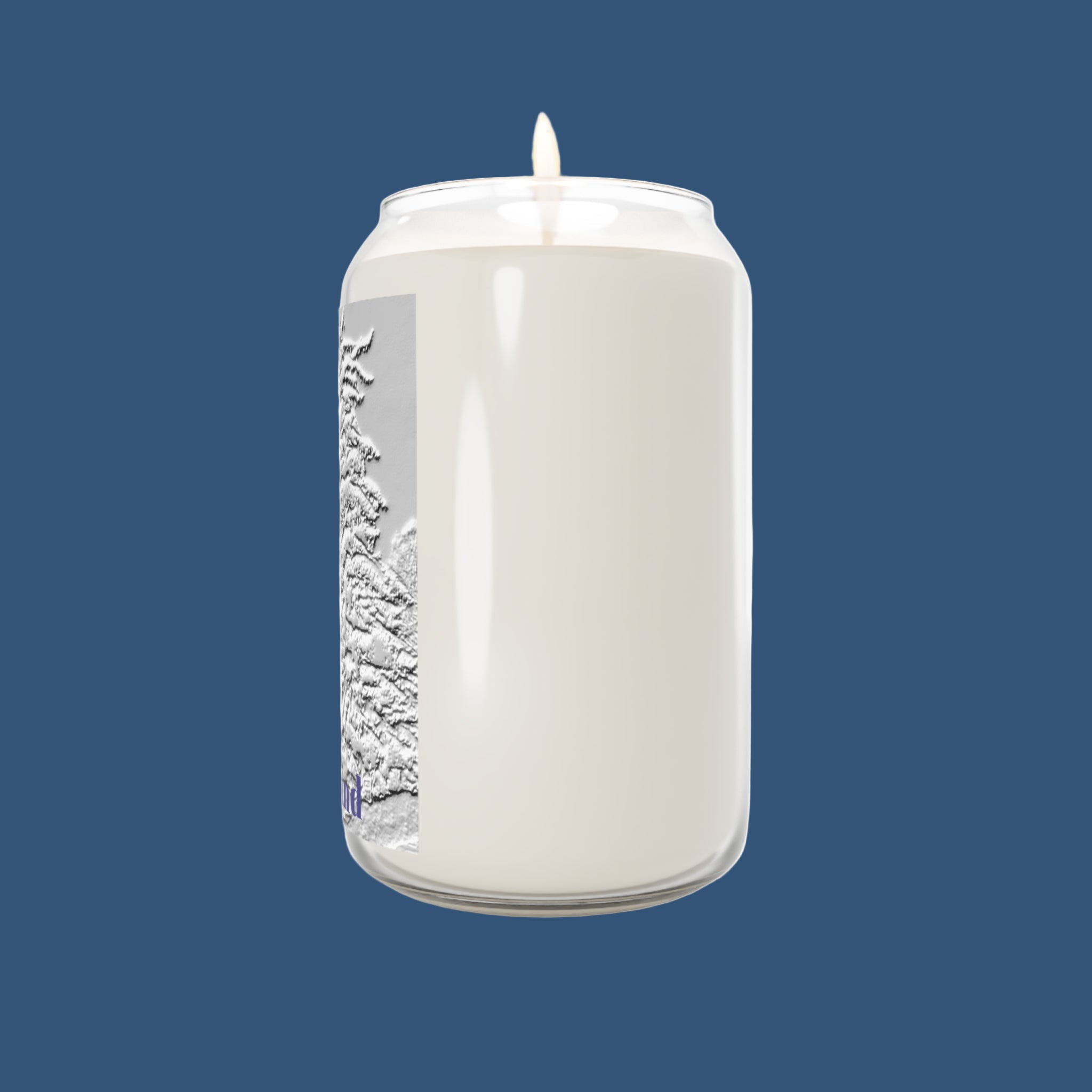 White candle in a glass jar with a label on a white background