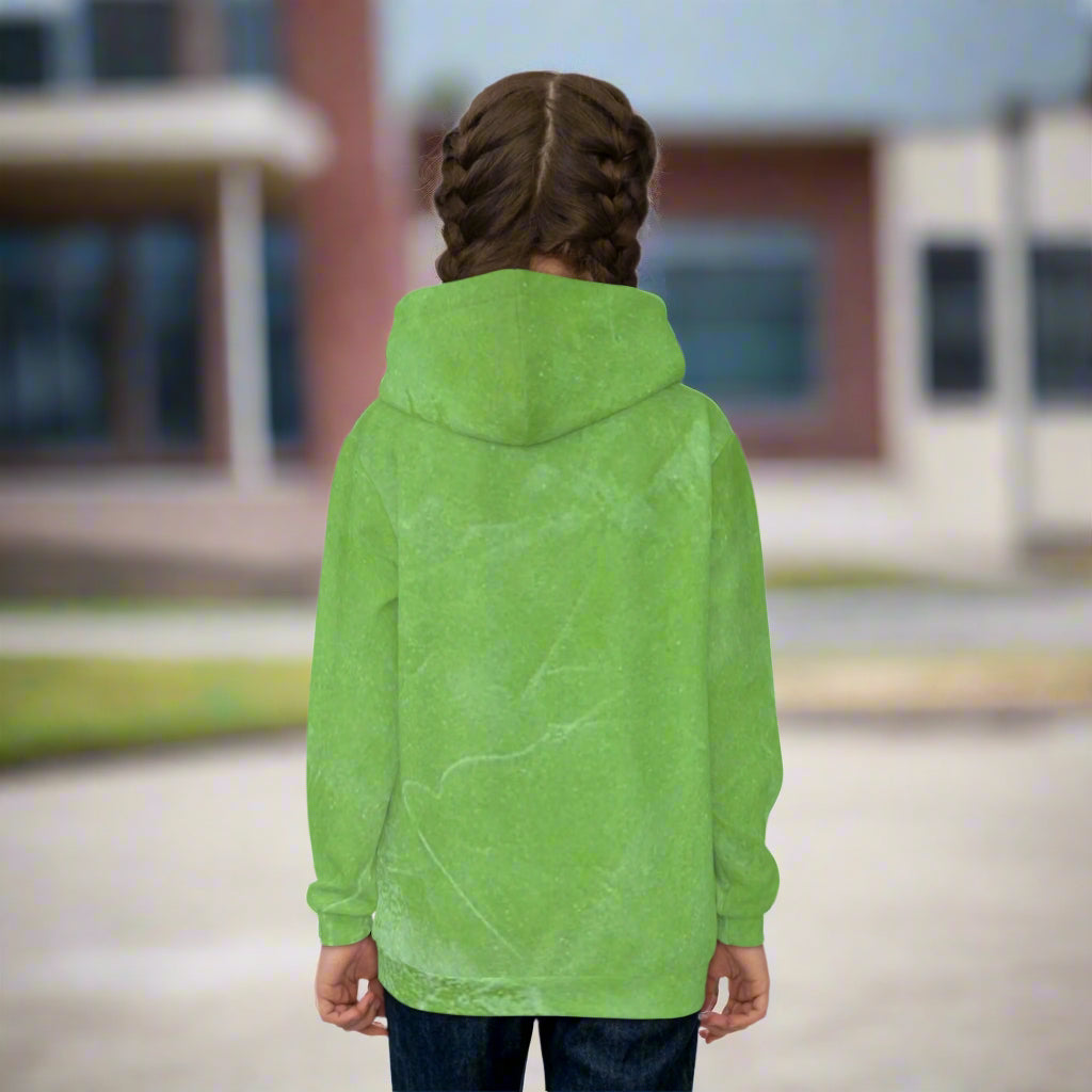 Person wearing a green hoodie from behind in a school yard background