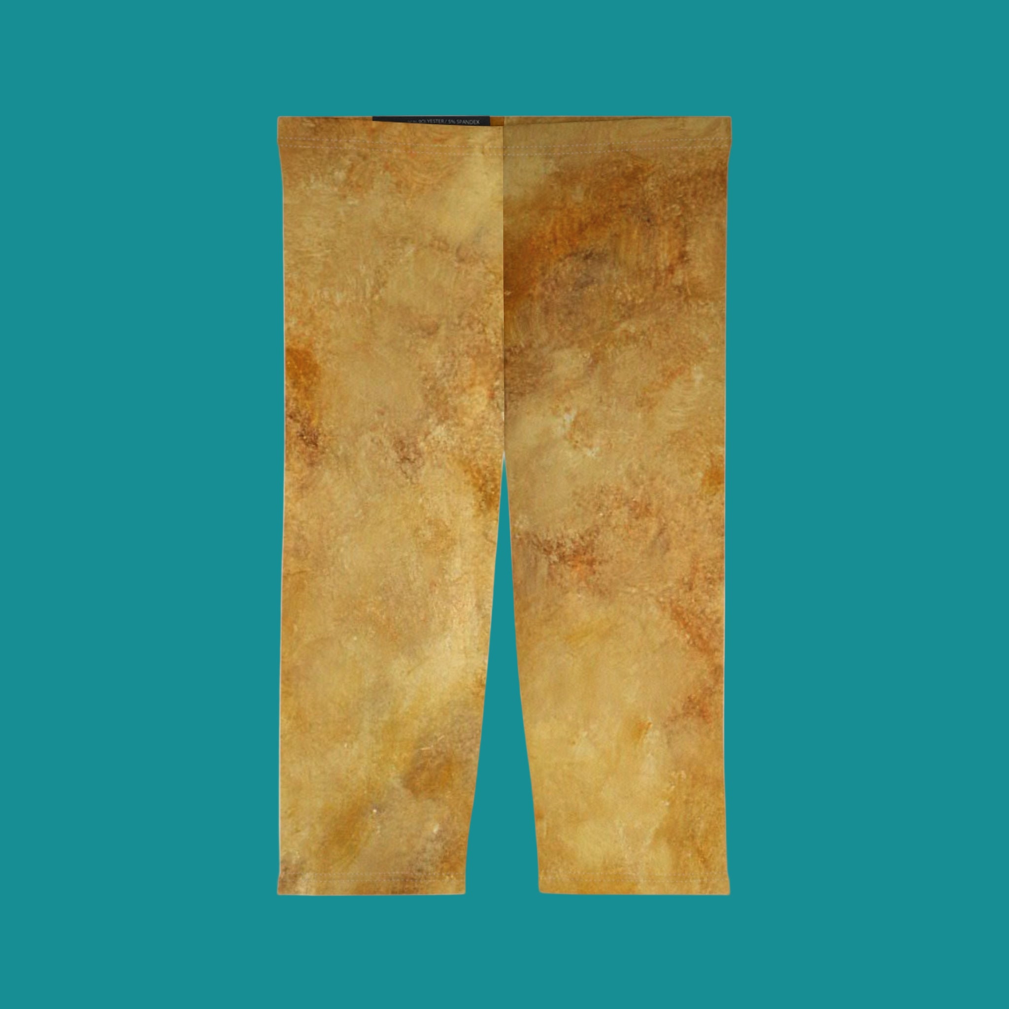 Brown abstract print on woman's leggings in a front view