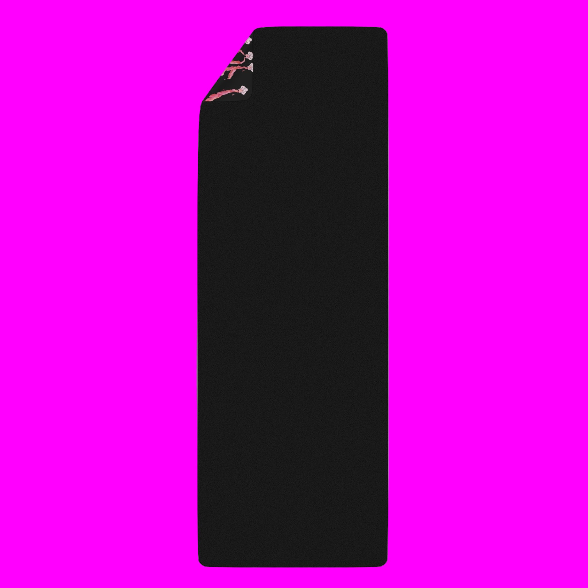 Black back of yoga mat with pink and white design on a white background