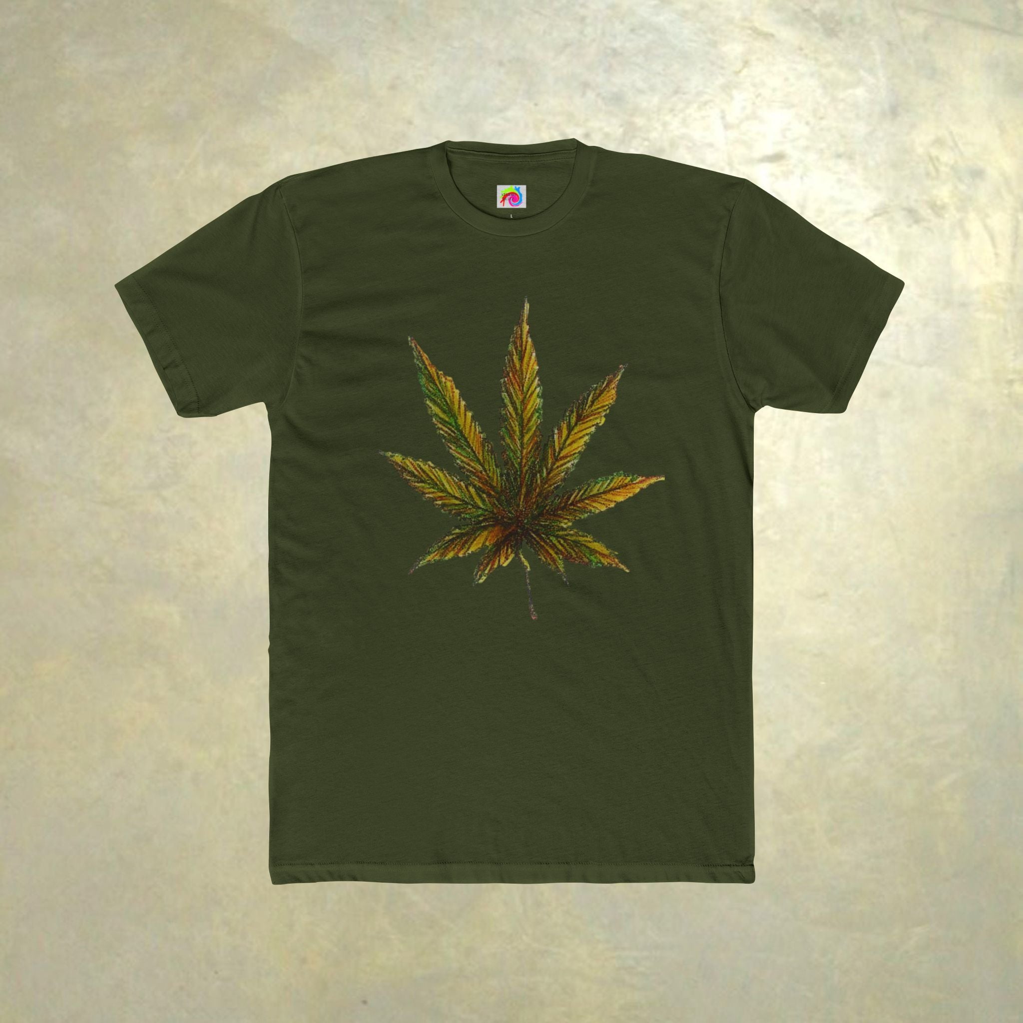 Green t-shirt with a cannabis leaf design on a textured beige background