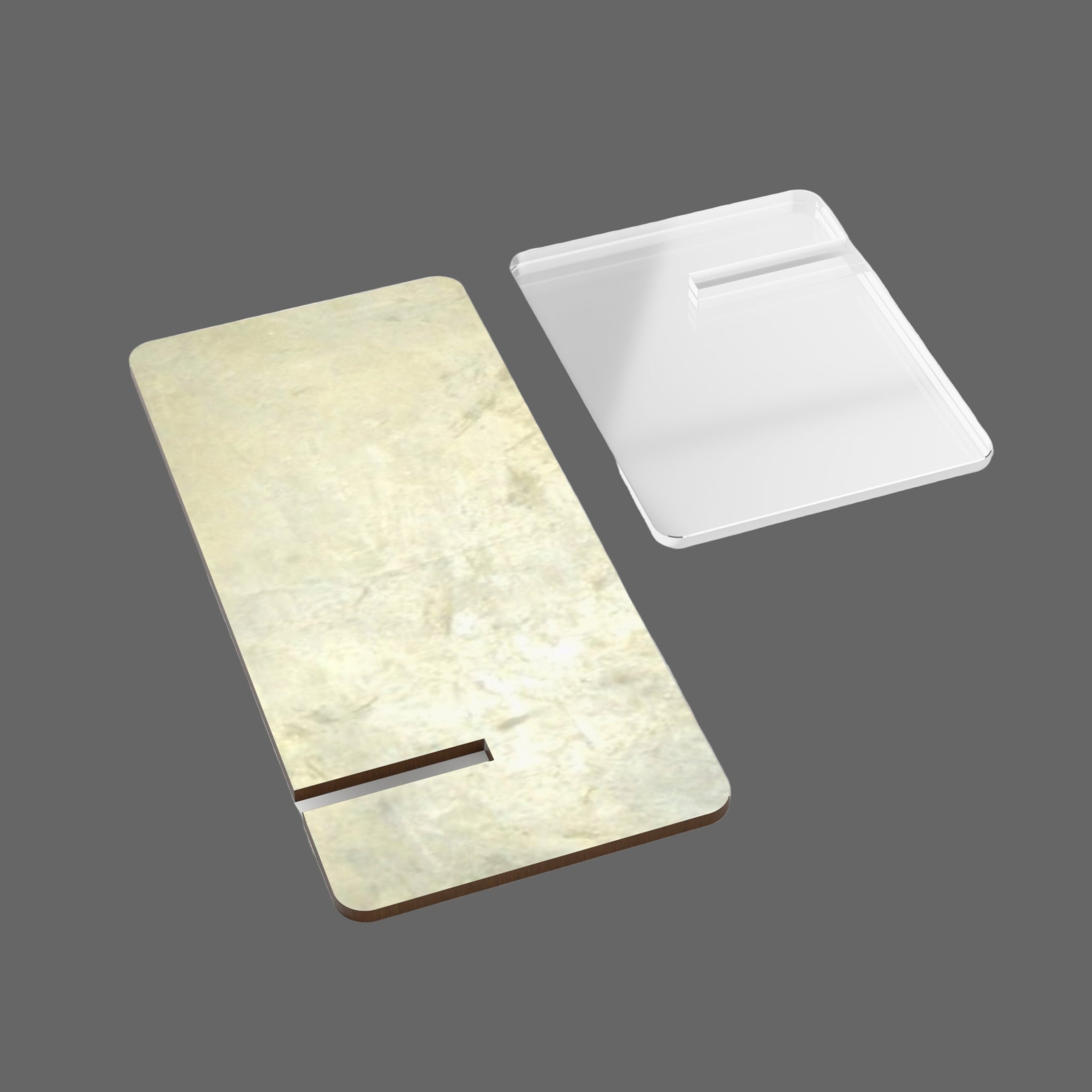 Rectangular smart phone stand disassembled with marble pattern on a light background
