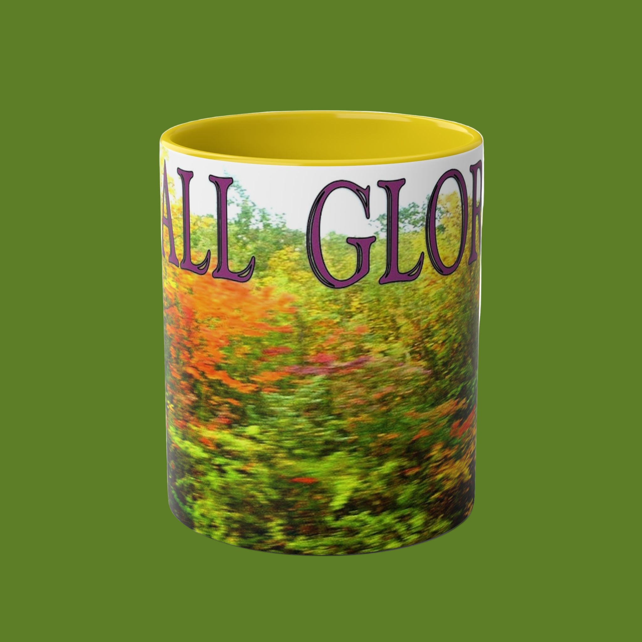 Mug with 'Fall Glory' text and colorful landscape design on a green background