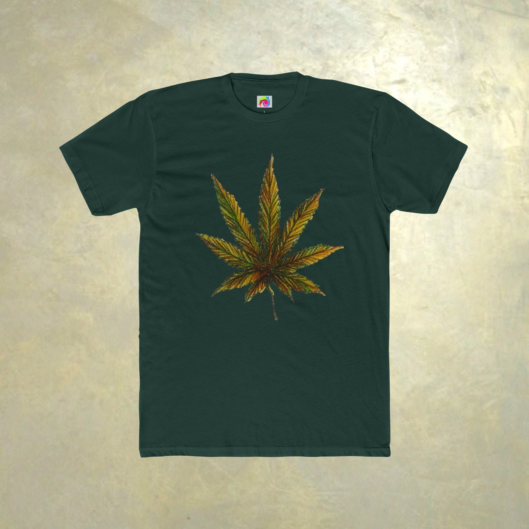 Green t-shirt with a cannabis leaf design on a beige background