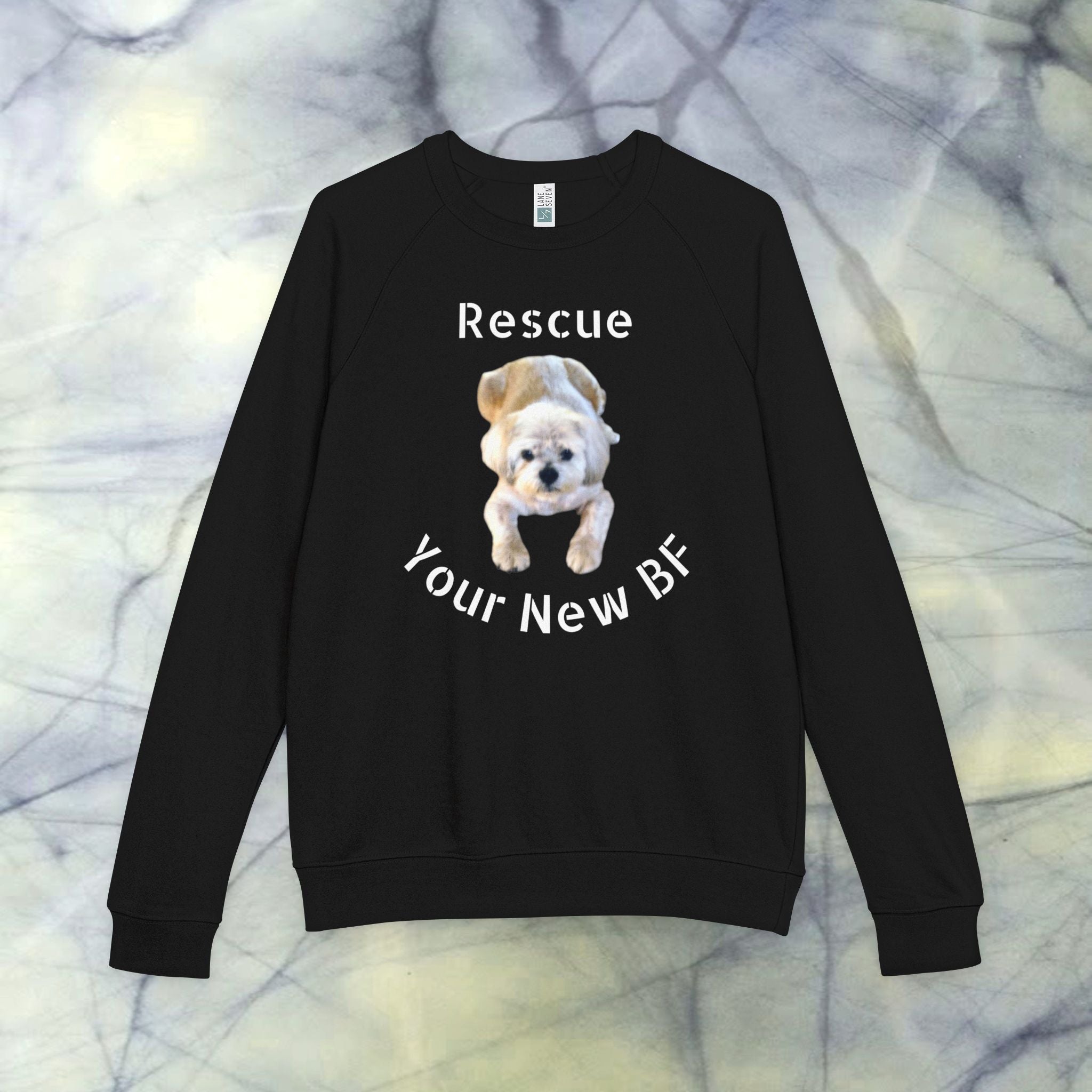 Black sweatshirt with a dog graphic and text on a marble background