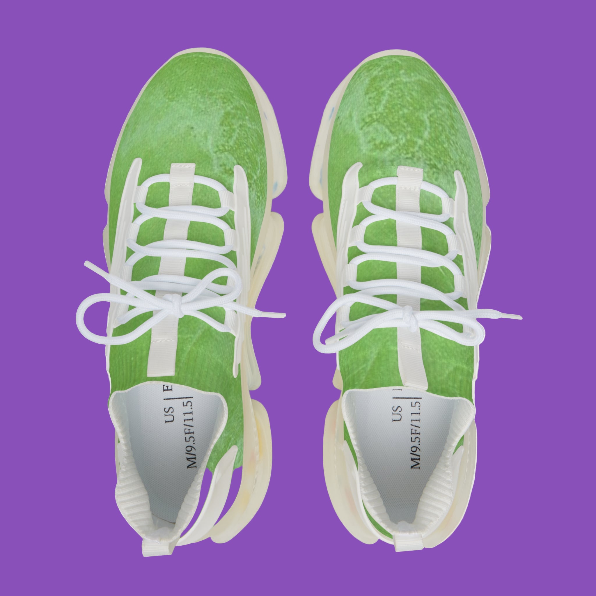 Green sneakers with white laces on a white or black background
