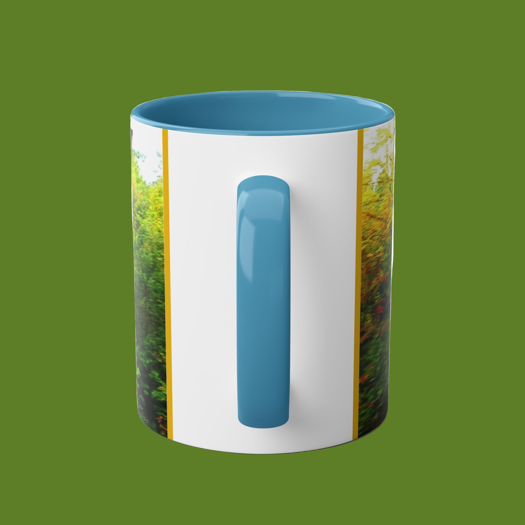 Mug with blue interior and handle, featuring a nature-themed design on a green background