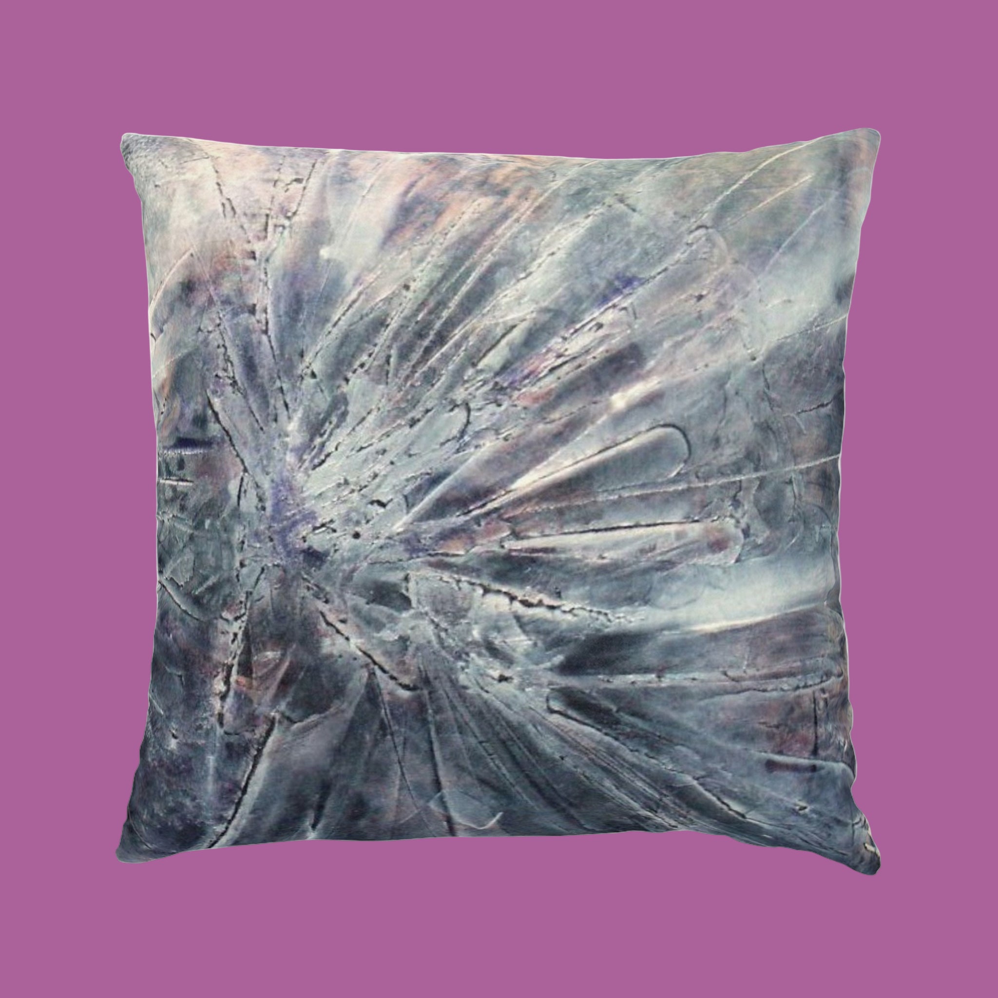 Decorative pillow with abstract design on a pink  background