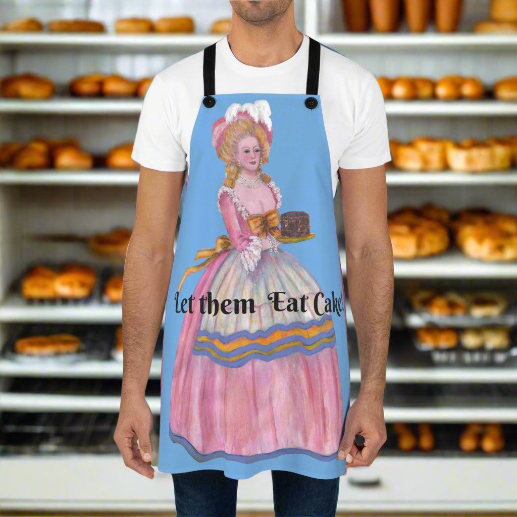 Person wearing a blue apron with a decorative design and text on a white background