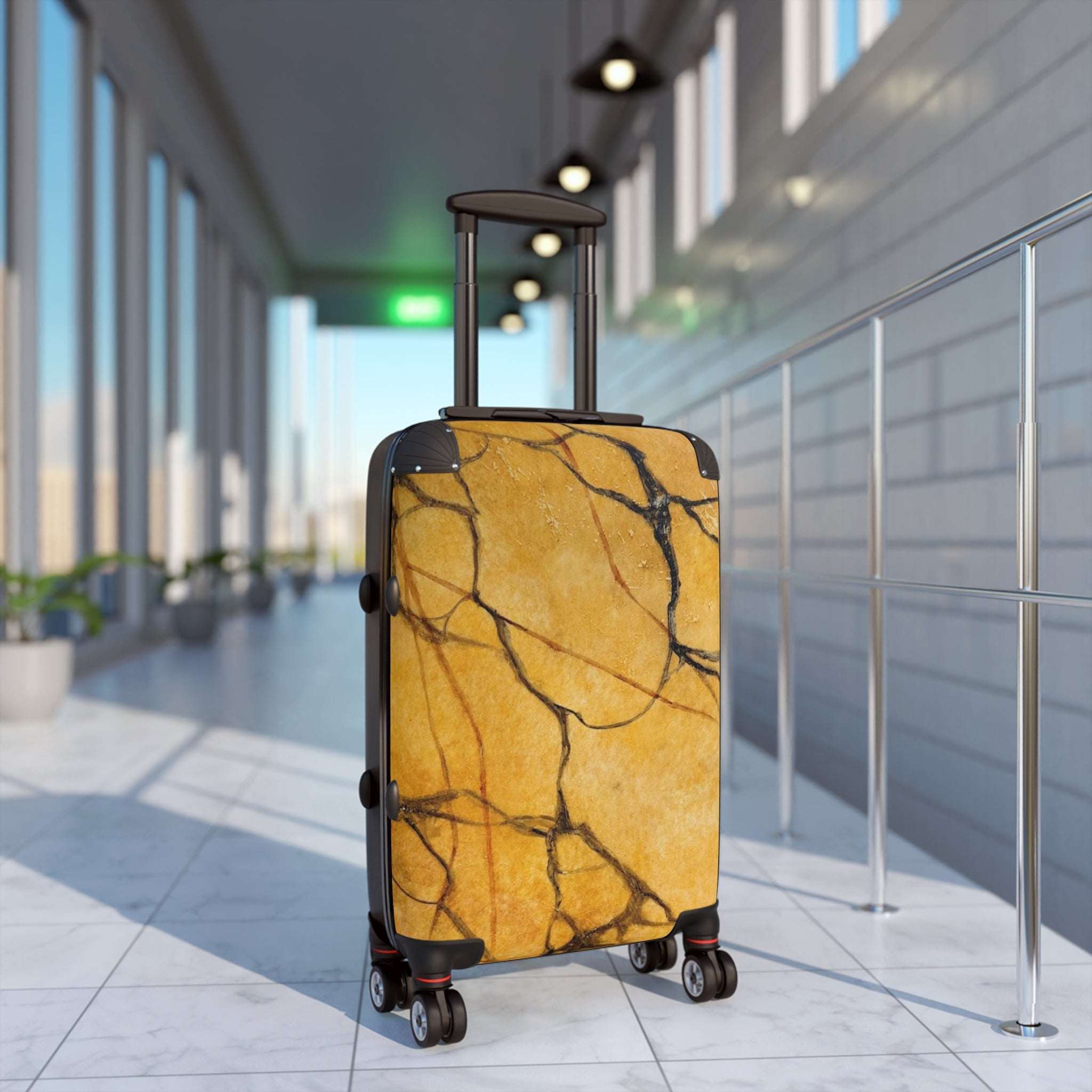 gold marble luggage on wheels 