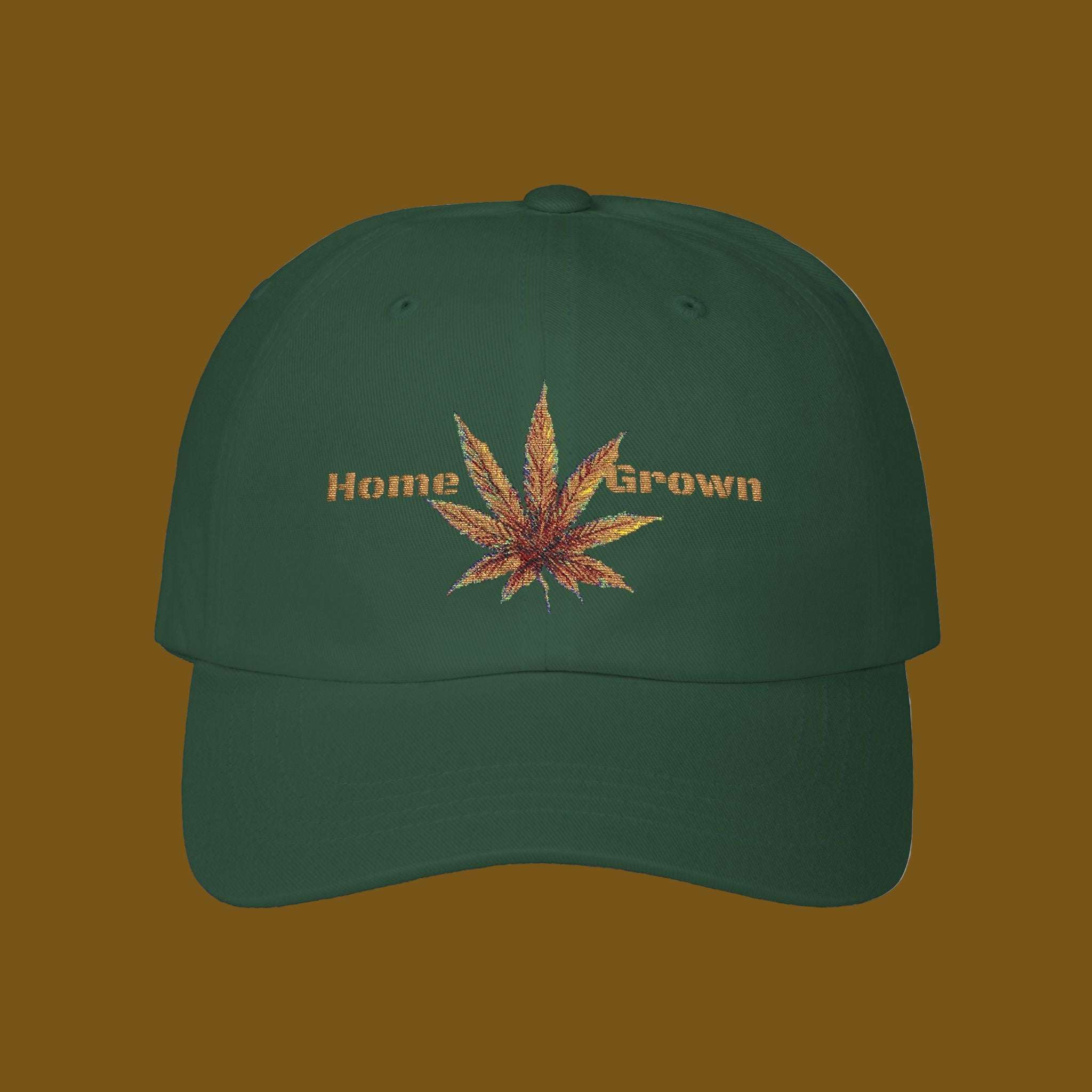 Green cap with a cannabis leaf and 'Home Grown' text on a brown background