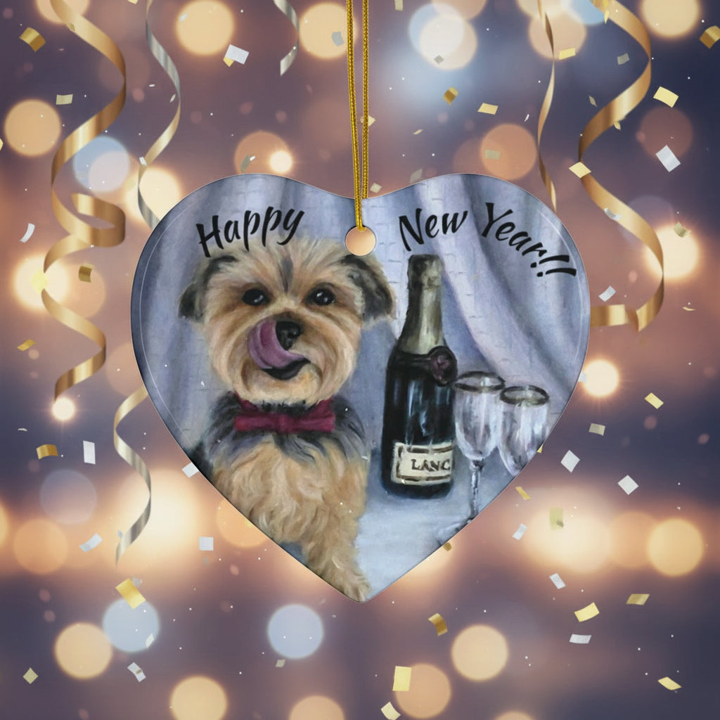 Heart-shaped ornament with a dog and champagne bottle with champagne flutes, featuring 'Happy New Year' text.