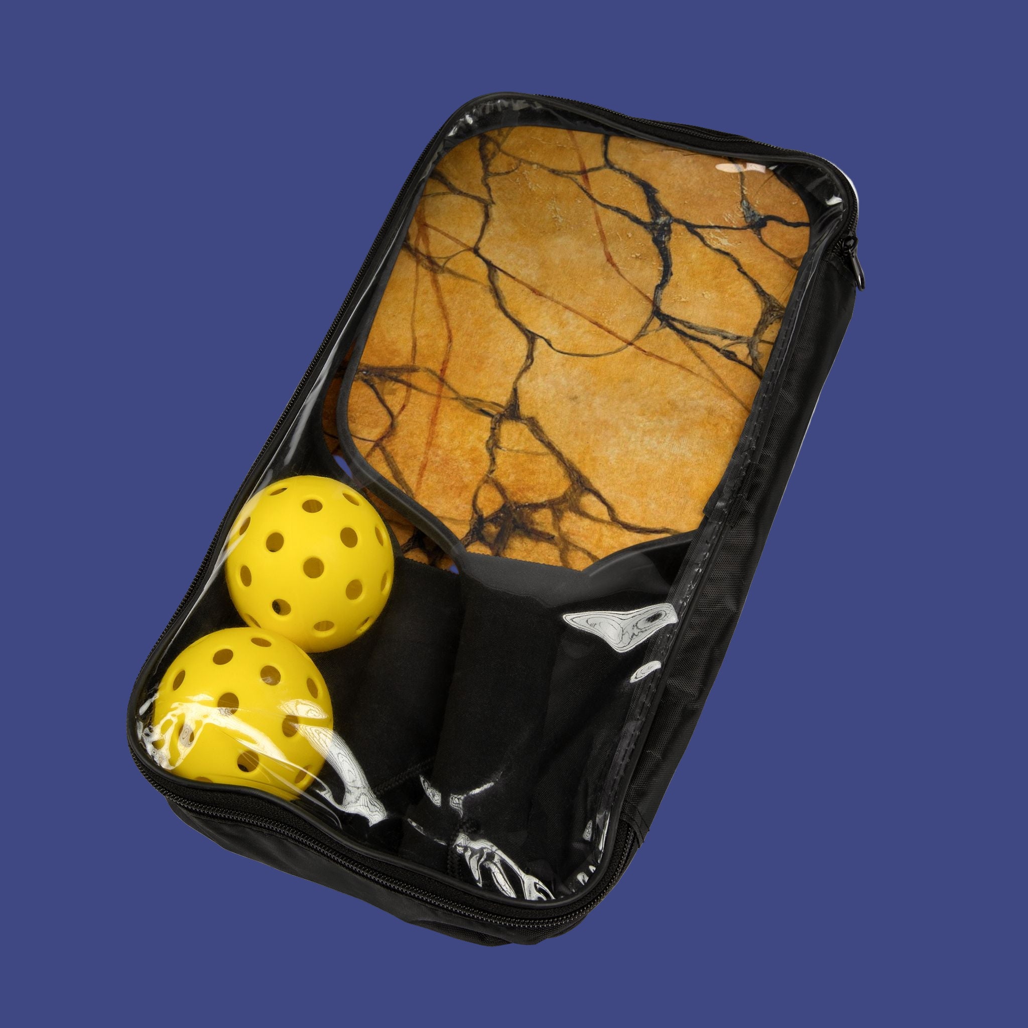 Black marble-patterned pickleball bag with two yellow pickleballs on a blue background