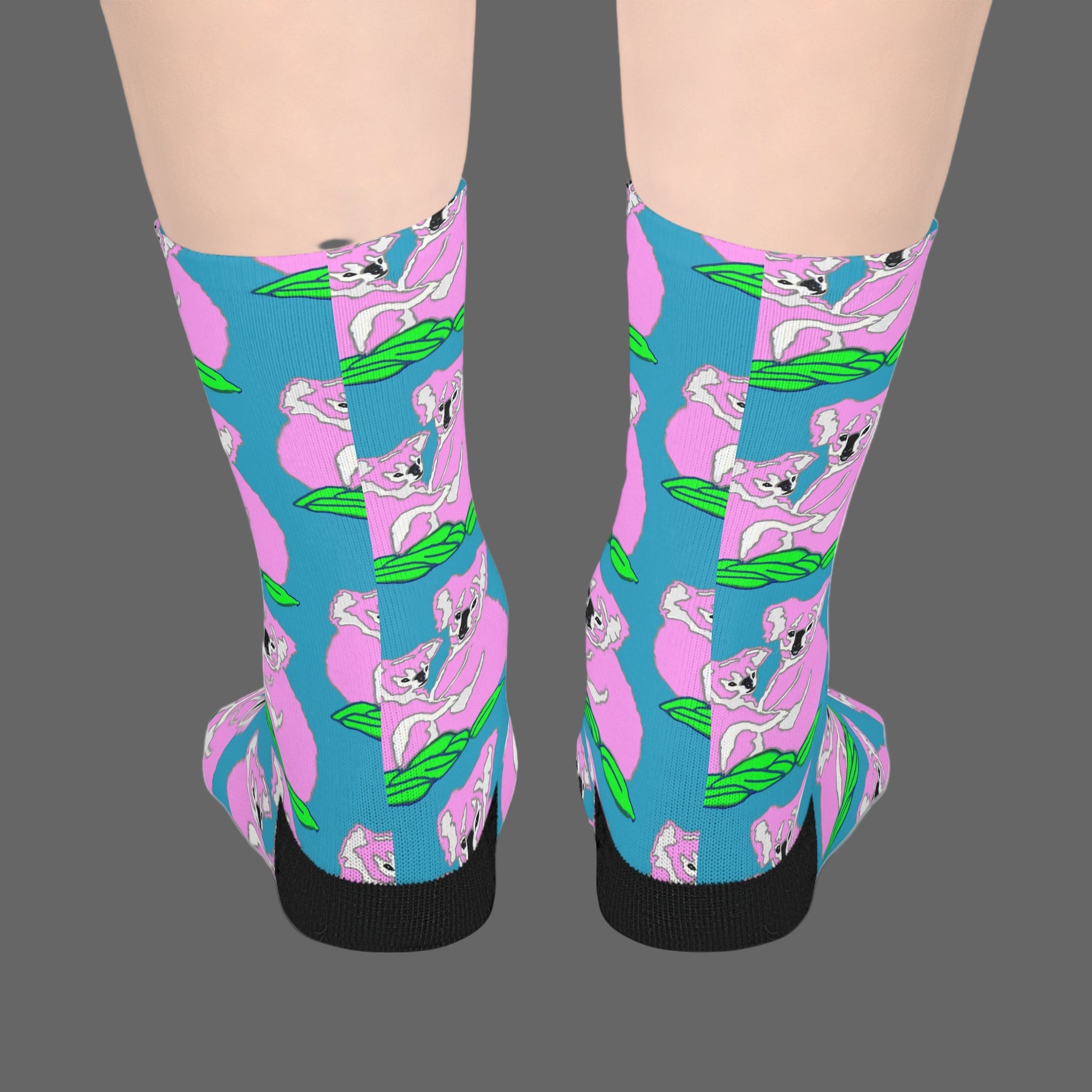 Colorful socks with a pattern of cartoon characters on a white background