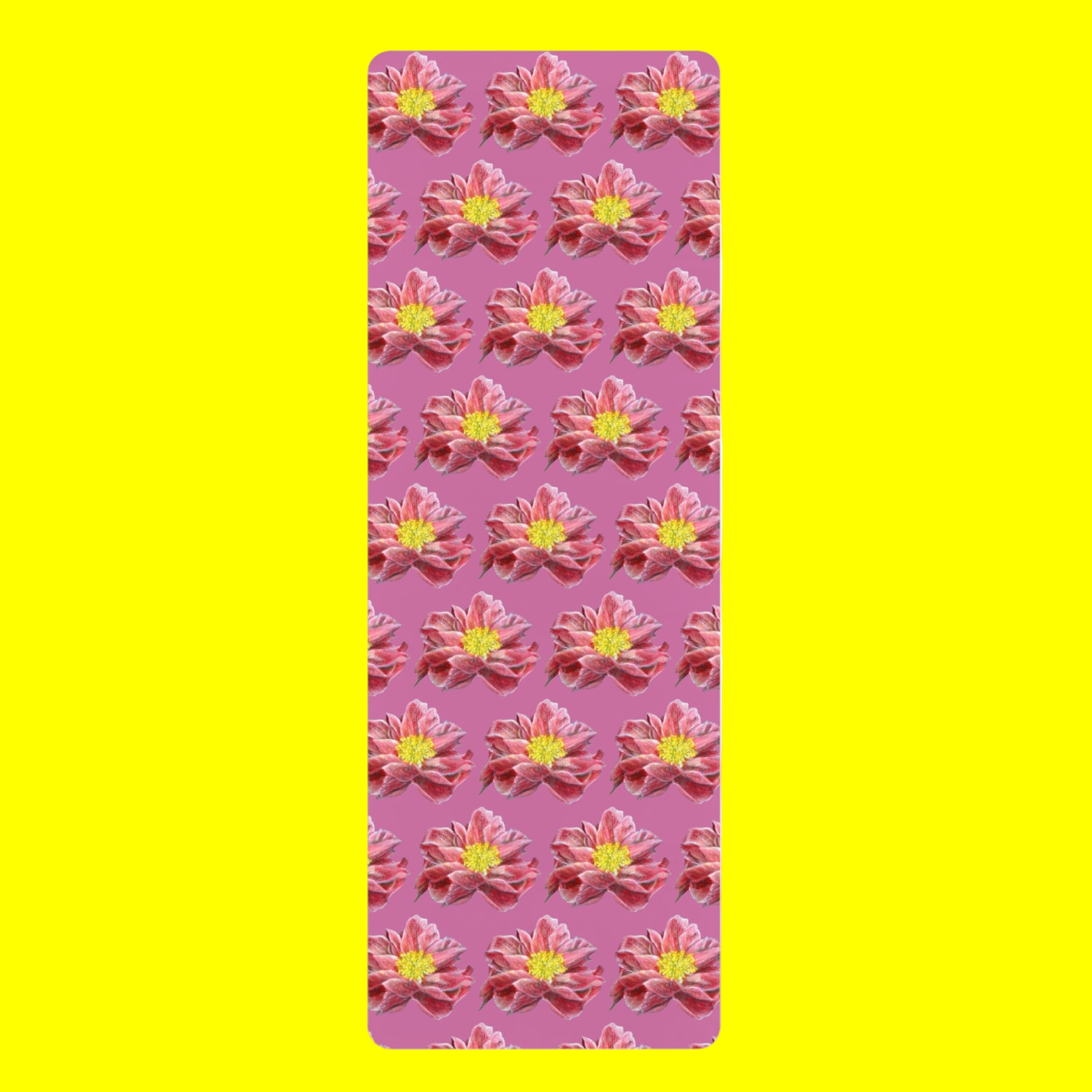 Yoga mat with pink floral pattern on a pink background