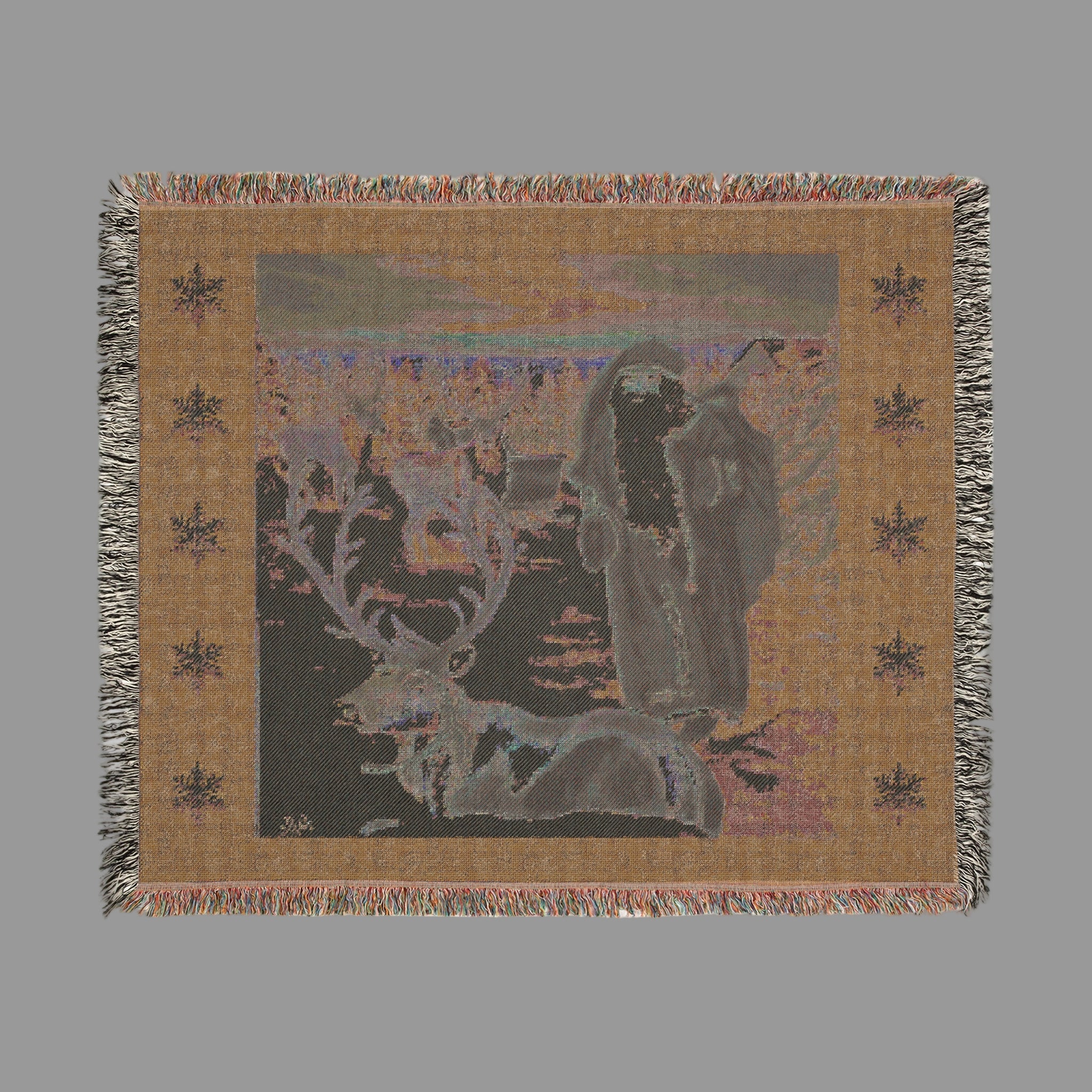 Back of Woven blanket with deer and bear design on a beige background
