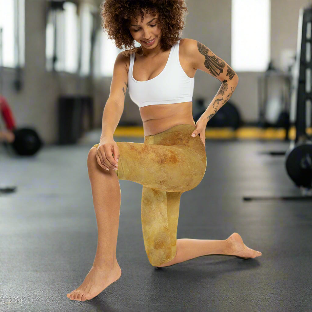 Woman in abstract design leggings on a white background