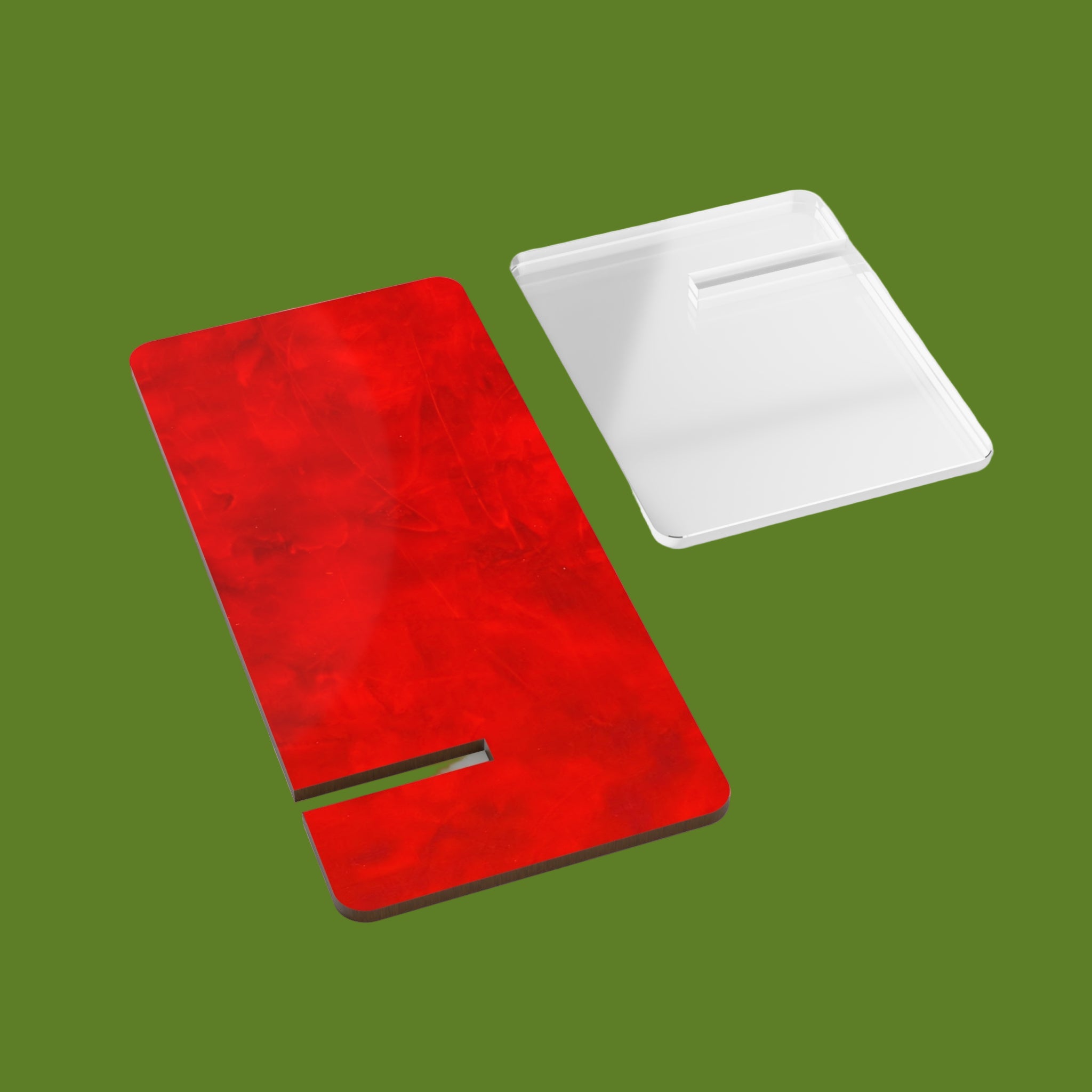 Red notebook with a white cover on a green background