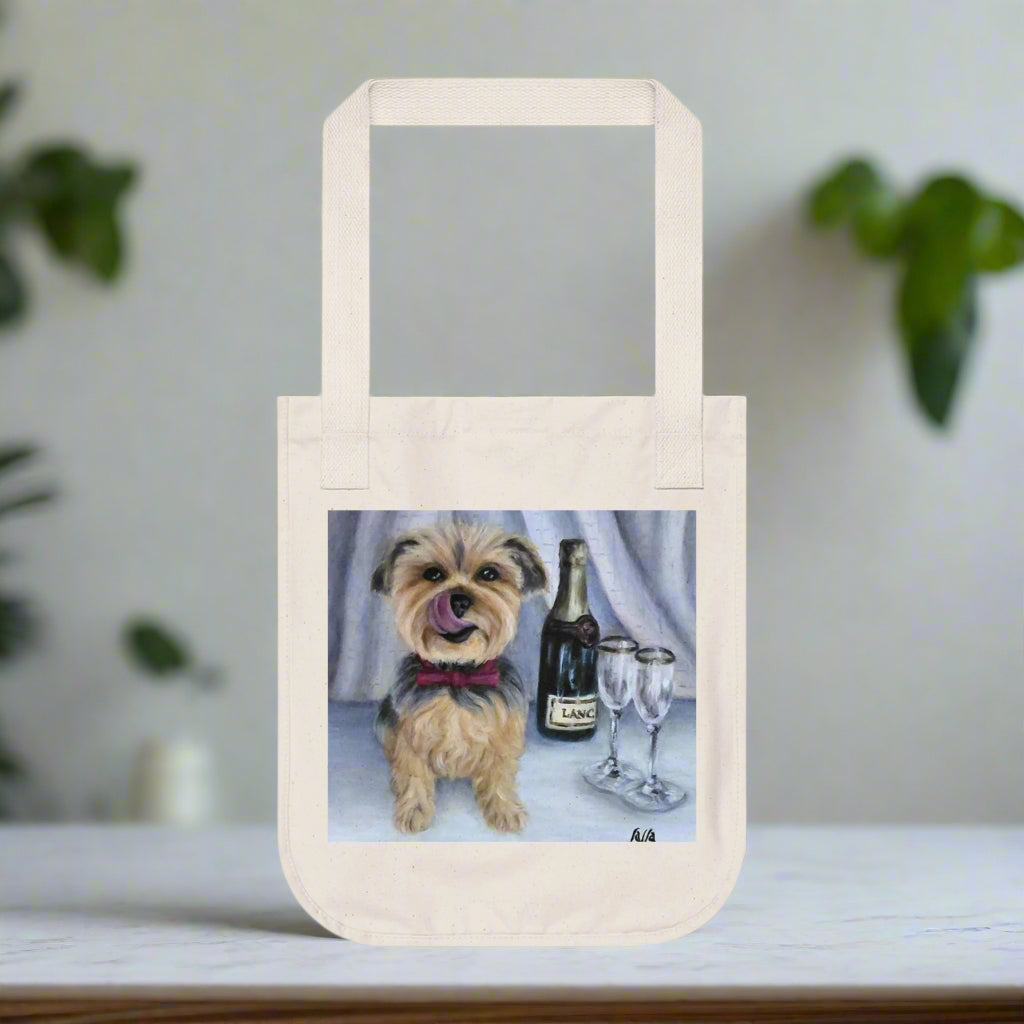 Canvas tote bag with a dog and champagne design on a white background